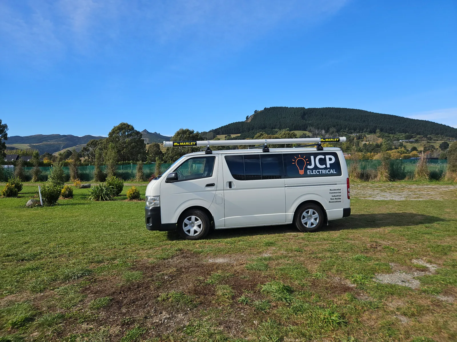 The JCP Electrical work van out in the Canterbury hills